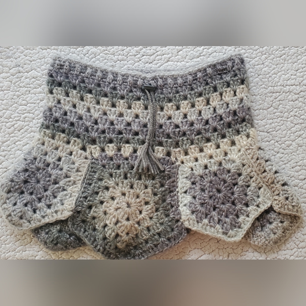 Small handmade crochet skirt / cover us. Waist 23 inches. Length 13 inches.
